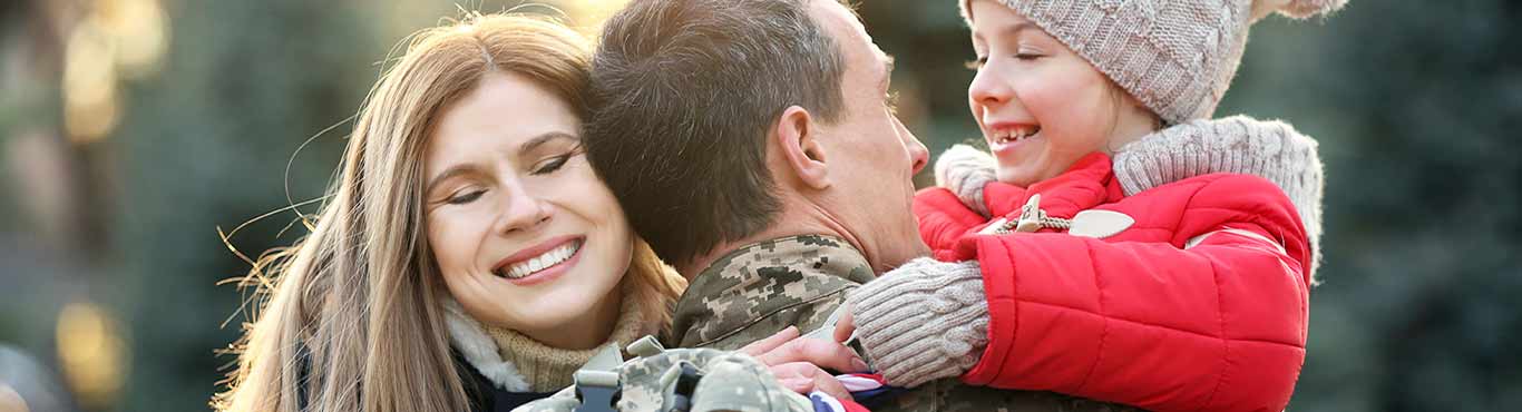 Military family hugging