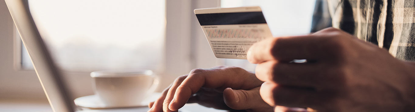 Person paying online using a credit card
