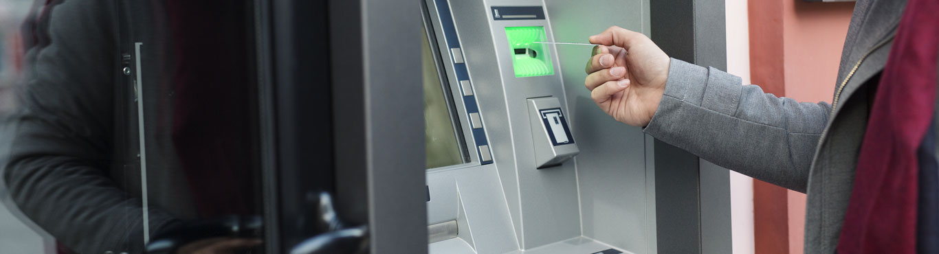 Person using ATM