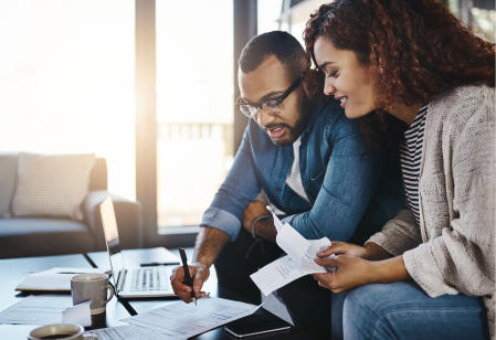 Couple reviewing loan paperwork