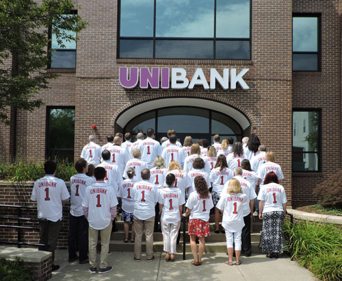 UniBank employees wearing Worcester Red Sox jerseys