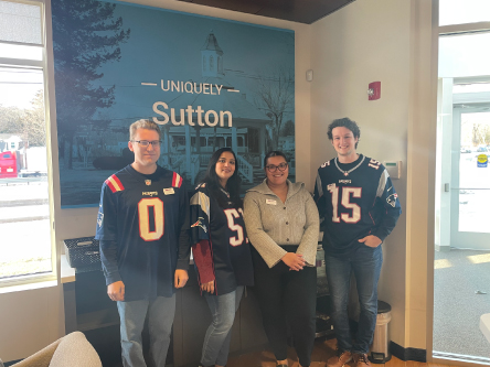 UniBank Sutton employees dressed in Patriots jerseys